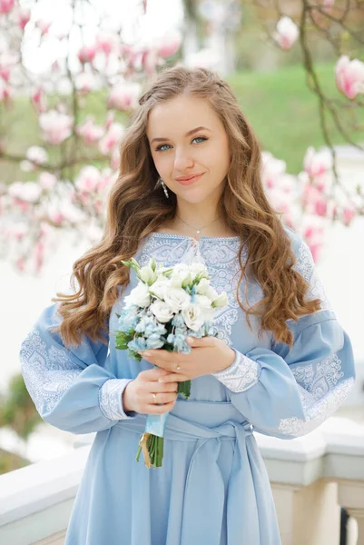 Beautiful Woman Standing Blooming Magnolia Beautiful Girl Blue Dress Pale —  Fotos de Stock