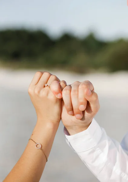 Hands Young Couple Joined Little Fingers — Stockfoto