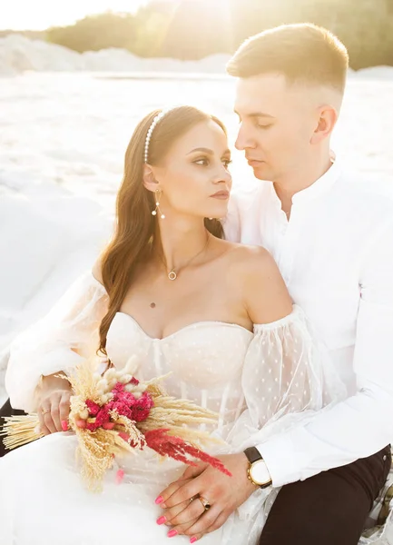 Stylish Wedding Couple Sitting Sand Soft Light Natural Colors — Photo