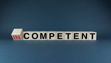 Competent or Incompetent. Cubes form the words Competent or Incompetent. Concept of behavior in business and at work