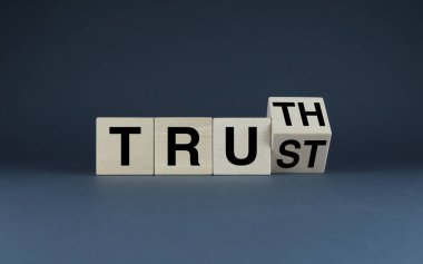 Trust to Truth. Cubes form the words Trust to Truth. Business concept based on trusting business relationships and partnerships