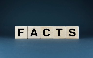 Fact. Cubes form the word Fact. Concept of Real Information