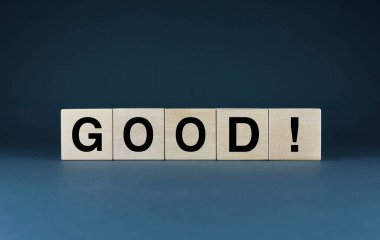 Good. Cubes form the word Good. An extensive concept of the word Good used in different areas of life