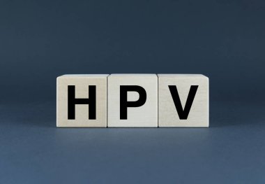 HPV. Cubes form the word HPV. The concept of HPV Human Papillomavirus in medicine