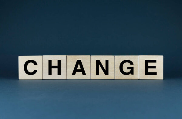 Change. Cubes form the word Change. The broad concept of the word Change, ranging from business to personal life