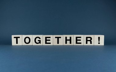 Together. Cubes form the word Together. The broad concept of the word Together used in various areas of business and life