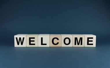 Welcome. Cubes form the word Welcome. The concept of the word Welcome is a greeting used in various areas of business and personal life. clipart