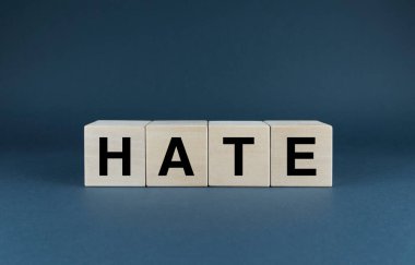 Hate. Cubes form the word Hate. Hate word concept - feeling emotion