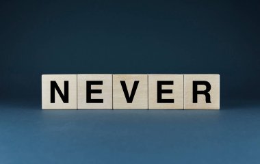 Never. Cubes form the word Never. An extensive concept of the word Never used in different areas of life and activity