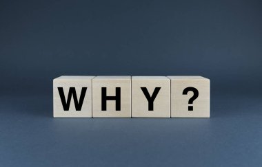 Why. Cubes form the word Why. The concept of the word Why used in business and life
