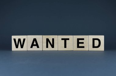 Wanted. Cubes form the word Wanted. The concept of the word Wanted