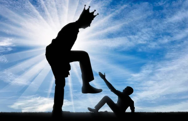 Selfishness. The big man with the crown on his head intends to destroy the little man. The concept of behavior as a selfish tyrant and dictator in business, politics and life. Silhouette