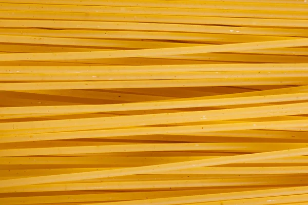 Espaguetis italianos o Macarrones de fideos Pasta fondo de alimentos crudos o —  Fotos de Stock