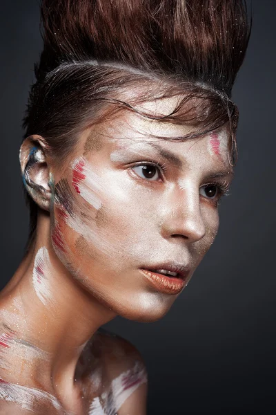 Girl with stylish haircut in the paint — Stock Photo, Image