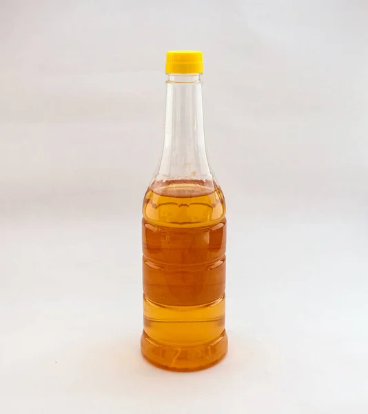 Little Apple Cider Vinegar Transparent Bottle Stands Background Selective Focus — Fotografia de Stock