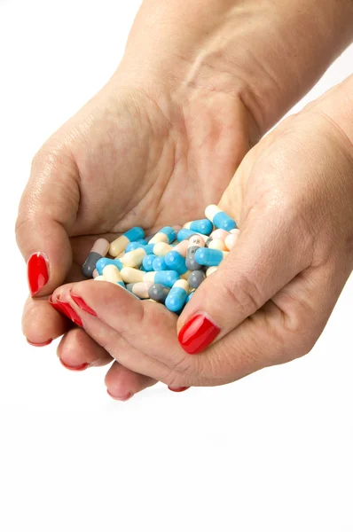 Geneeskunde tabletten in hand geïsoleerd — Stockfoto