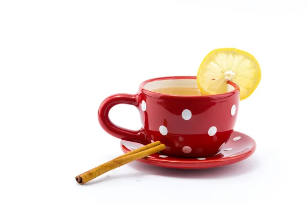 Cup of tea with lemon and cinnamon — Stock Photo, Image