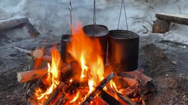 Three Smoky Pots Water Hang Large Fire Yellow Orange Flames — Stockvideo