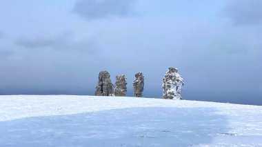 Weathering pillars, Komi Republic, Russia. Amazing Manpupuner Plateau. One of the seven wonders of Russia. Geological monument in the Troitsko-Pechora region.