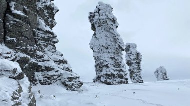 One of the seven wonders of Russia. Plateau Manpupuner. Weathering pillars in the Komi Republic, Russia. Geological monument in the Troitsko-Pechora region.
