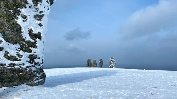 View of the pillars of the Manpupuner Plateau. Weathering pillars, Komi Republic, Russia. One of the seven wonders of Russia. Geological monument in the Troitsko-Pechora region.