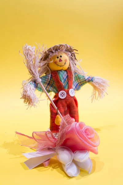 Scarecrow and flower — Stock Photo, Image