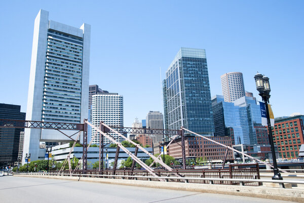 The street leads to Boston downtown with a welcome sign on lampposts (Massachusetts).