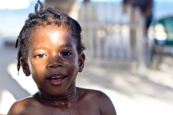 Belizean kid by the beach — Stock Photo, Image