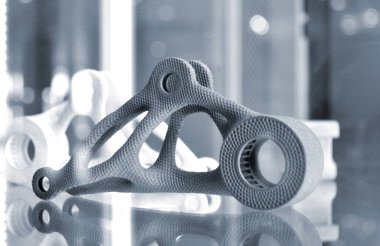 Yakın plan tozdan 3D yazıcıya yazdırılmış gri soyut nesne