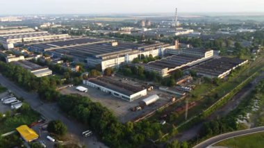 Aerial Drone View Flight Over Many Large Industrial Buildings Structures