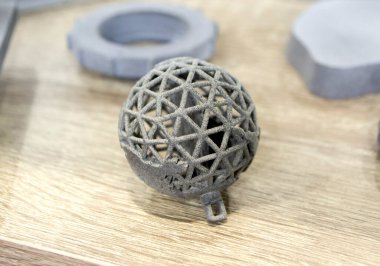 Models printed on 3D printer. Gray objects printed on 3D printer made plastic