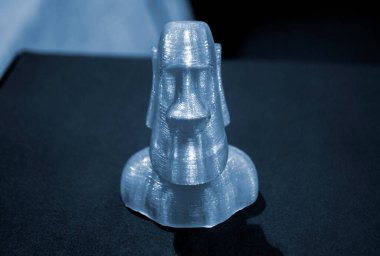 Model printed on 3D printer. Many object printed on 3D printer made of plastic clipart