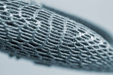 Metal makro için 3D yazıcıya basılmış mankenler. Nesne yüzeyi yakın plan.