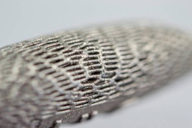 Metal makro için 3D yazıcıya basılmış mankenler. Nesne yüzeyi yakın plan.
