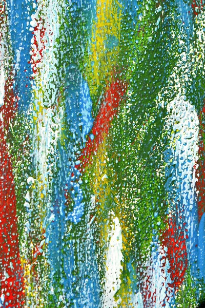 キャンバス上のカラフルなブラシストロークの創造的な背景を閉じます 緑の赤白青黄色のマクロのスミアブラシストロークから抽象アートの背景 絵具の質感の背景を描く — ストック写真