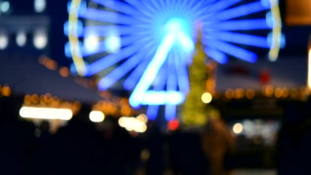 Ferris Wheel Decorated Blue Illumination Christmas Tree Black Silhouettes People — Stock Video