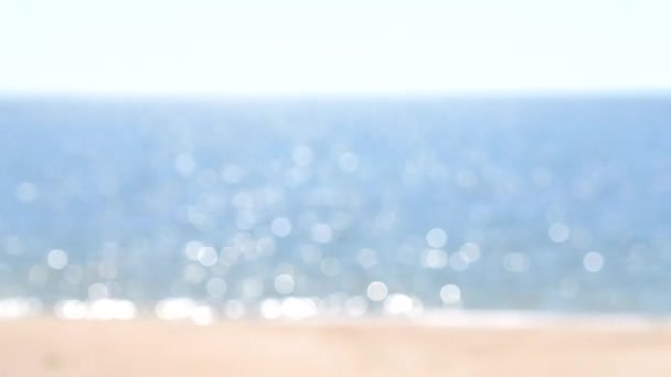 Blurred Background Sea White Sun Reflections Yellow Sandy Beach Blue — Stockvideo