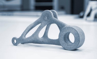 Laboratuvar ofisindeki 3D yazıcıya basılmış bir model. Plastik kapaktan 3D yazıcıya basılmış nesne. 3D yazıcıda yapılmış bir prototip. Yeni modern baskı teknolojisi kavramı. Çoklu Jet Füzyonu