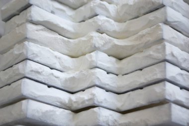 Detail objects printed on powder 3D printer and covered white polyamide powder close-up. Technology Multi Jet Fusion MJF. 3D prototype models created by new additive progressive 3d printing technology