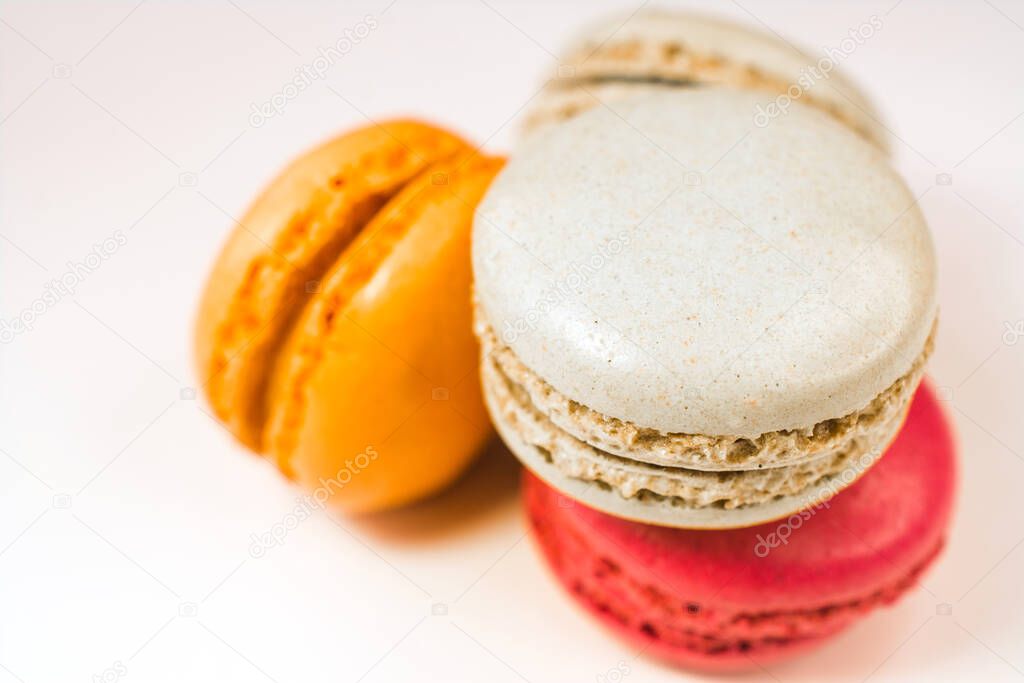 Colorful macaroons set on white backgorund