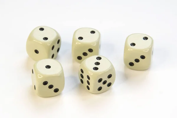 Four game dice isolated — стоковое фото