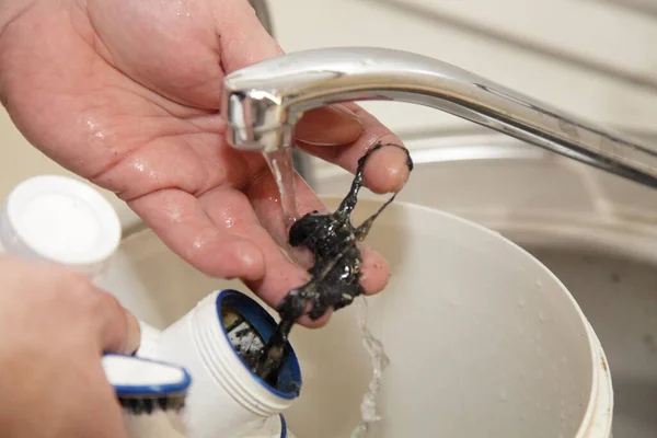 Plumber Worker Hands Cleans Clogged Plastic Water Trap Siphon Water — Stock Photo, Image