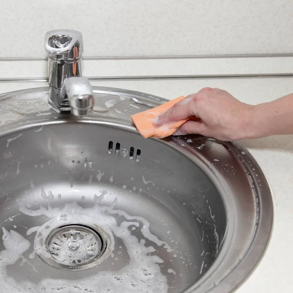 Cleaning Kitchen White Woman Hand Washes Metal Sink Orange Napkin — Stok fotoğraf