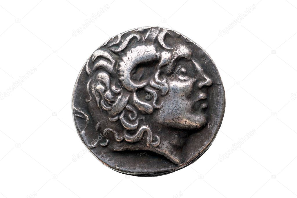 Greek silver Drachum coin replica of  Alexander the Great dated from 336-323 BC cut out and isolated on a white background, stock photo image
