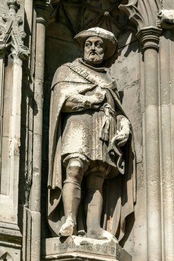 Henry VIII statue at Canterbury Cathedral in Kent England UK which is a popular tourist holiday travel destination and landmark attraction, stock photo image
