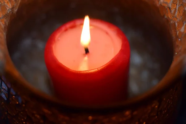 Burning red candle as a close up — Stock Photo, Image