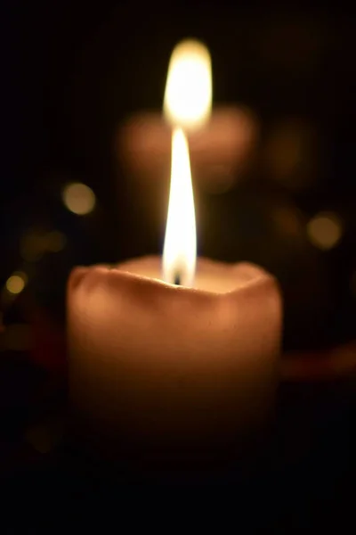 Burning beige candles as a close up — Stock Photo, Image