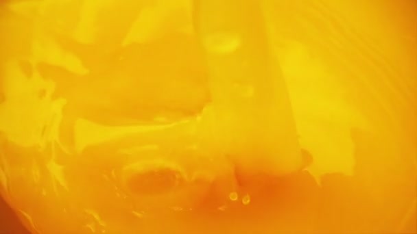 Pouring Splashing Orange Juice Slow Motion — Stock Video