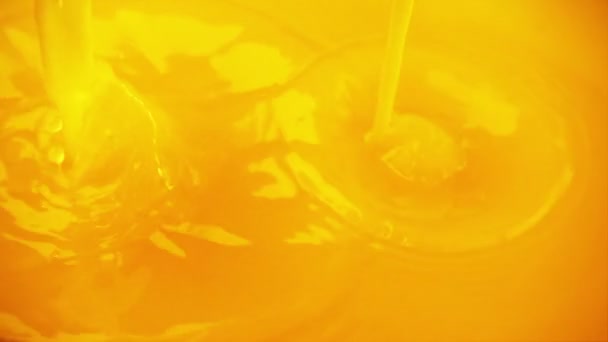 Pouring Splashing Orange Juice Slow Motion — Stock Video