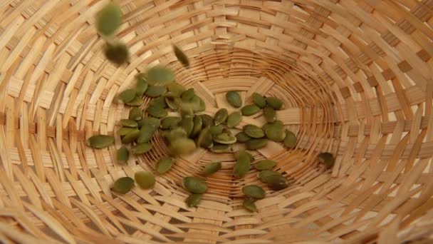 Pumpkin Seeds Fall Wicker Basket Slow Motion — Vídeo de stock